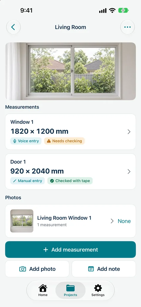Measure Genie Living Room list with Window 1 from voice entry marked needs checking and Door 1 checked with tape