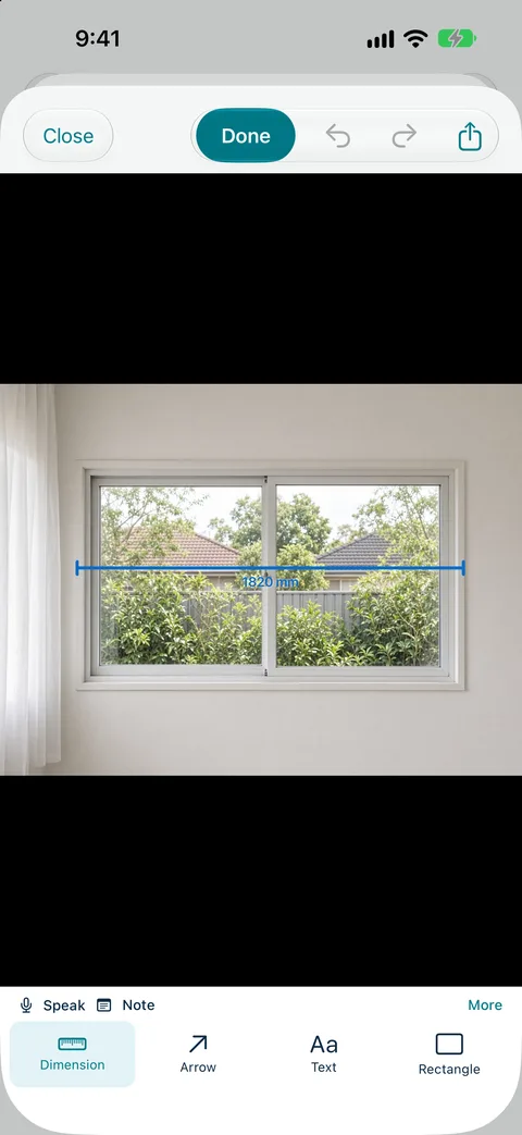Measure Genie photo markup with a dimension line drawn across a window